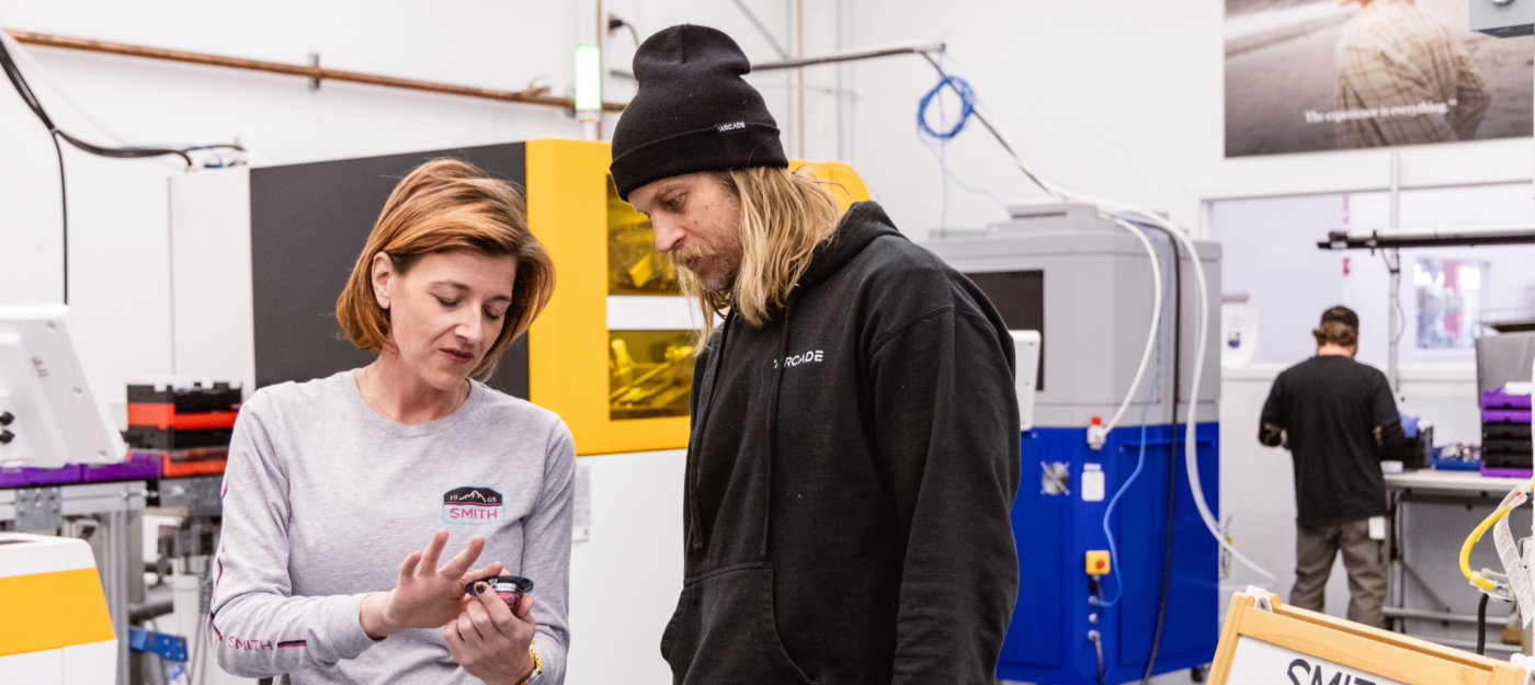 Cody Townsend learning about the process making Smith glasses at our lab in Utah. 